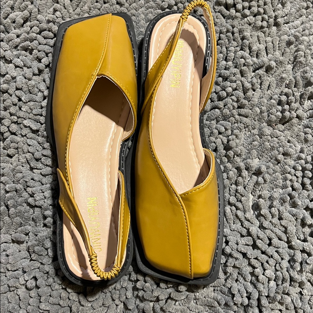Sling Backs with an inch heel. Size 9. In a trending color.! NWOT Leather Size 9